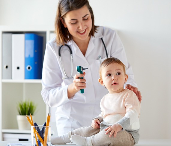 Pediatrics 1 A pediatrician examining a baby’s ear during a routine check-up at Levantine Medical Center, Al Ain